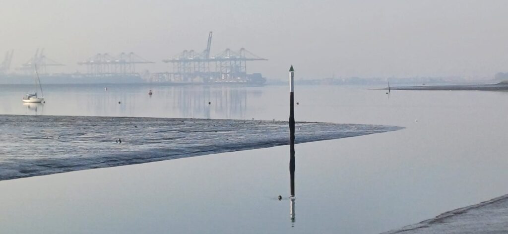 A Misty start from Suffolk Yacht Harbour with Felixstowe Docks in the distance